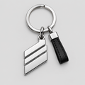 Chrome Bar Keychain with a polished three-bar charm, split ring and black pull tab