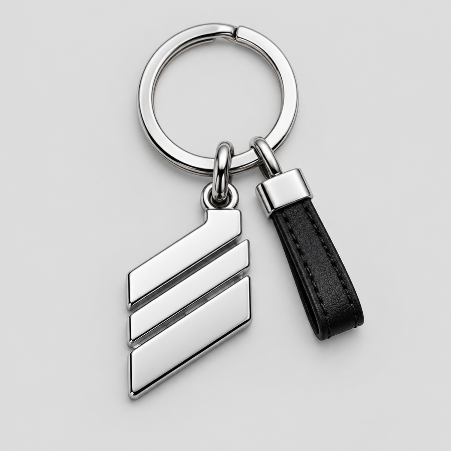 Chrome Bar Keychain with a polished three-bar charm, split ring and black pull tab