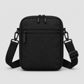 Orbit Shoulder Bag in black with webbing strap, front view