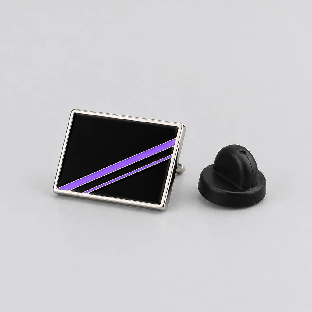 Static Seam Enamel Pin in black with nickel outline and rubber clutch back