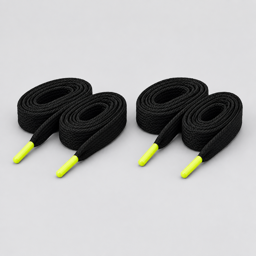 Voltage Flat Laces in black with neon yellow tips, two pairs coiled